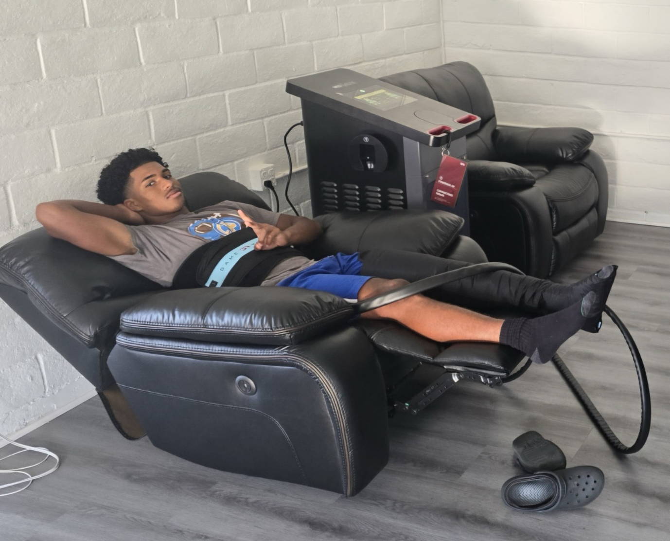 The Game Ready Med4Elite recovery system with a compression sleeve